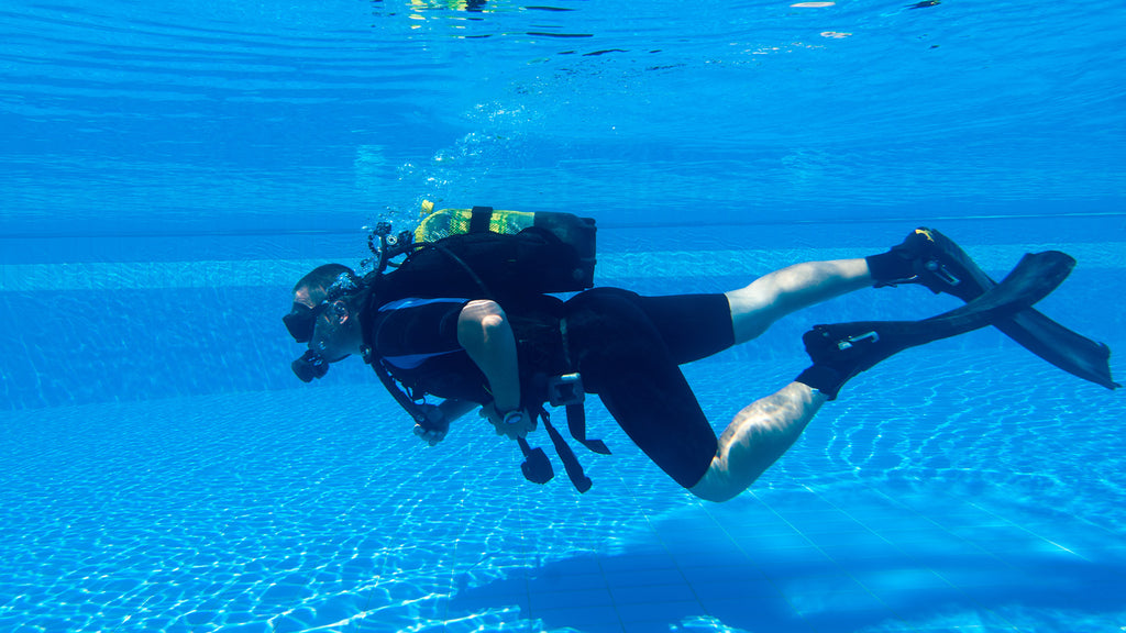 Dive into Efficiency: Introducing Our Special Scuba Diver Pool Maintenance!